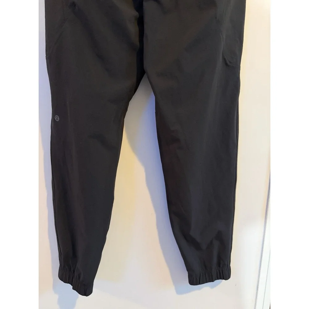 Lululemon Mens M Black Jogger Pants Drawstring Zip Pocket Tapered Athletic Sport
